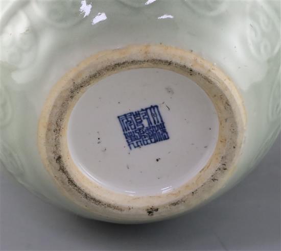A Chinese celadon glazed archaistic moulded vase, Qianlong underglaze blue seal mark to base, probably 19th century, H.30cm